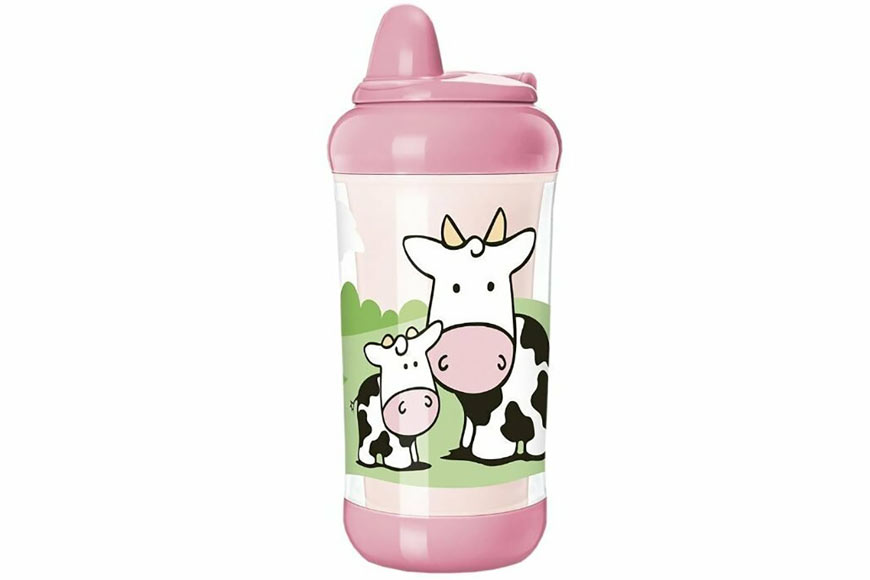 Photo of a pink sippy cup with cows on it