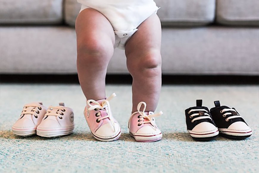 Photo of a baby wearing shoes