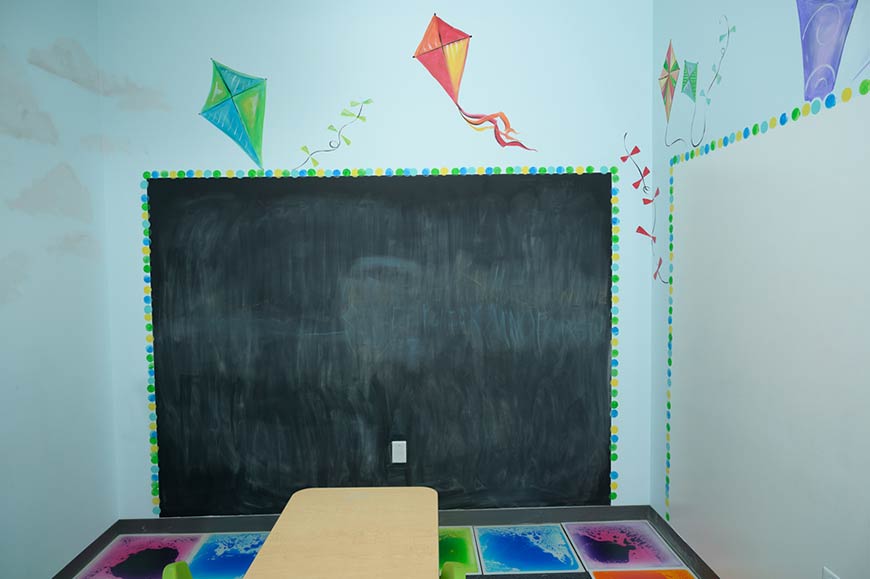 Photo of Southern Pines therapy area with chalk board
