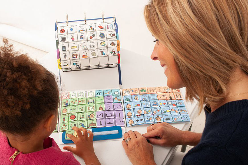 Photo of a little girl doing speech therapy with therapist
